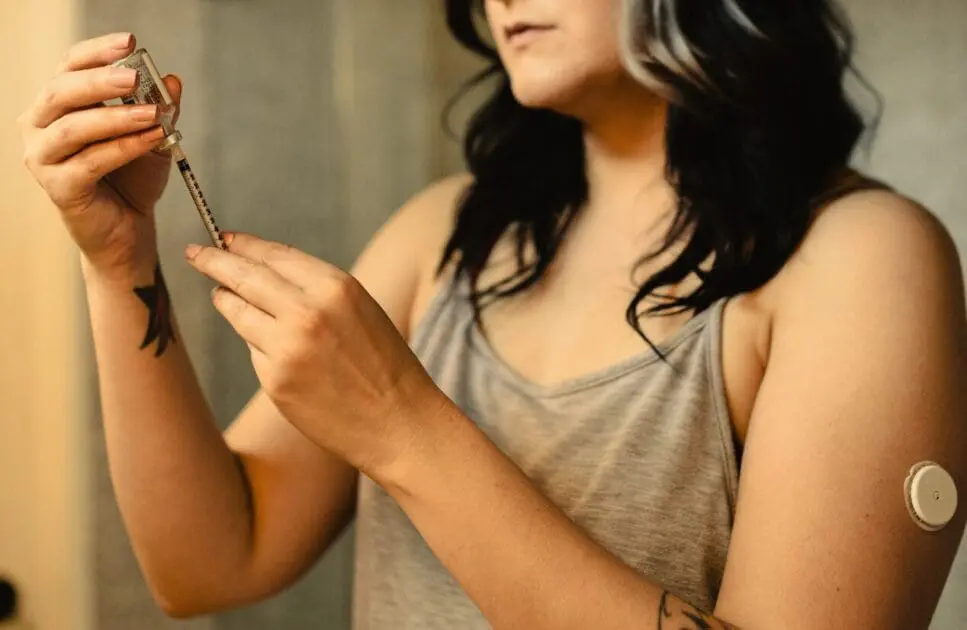 Woman with diabetes taking insulin shots. Causes of Constipation. Brisbane Livewell Clinic