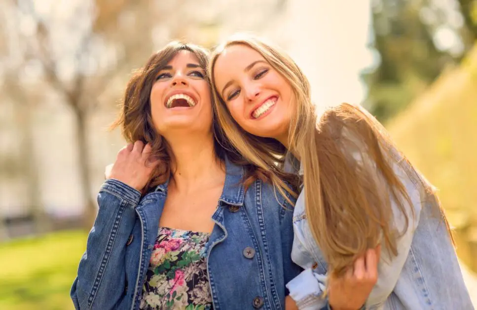 Two happy women hugging each other. Naturopath Toowoomba. At Home Hormone Test. Brisbane Livewell Clinic