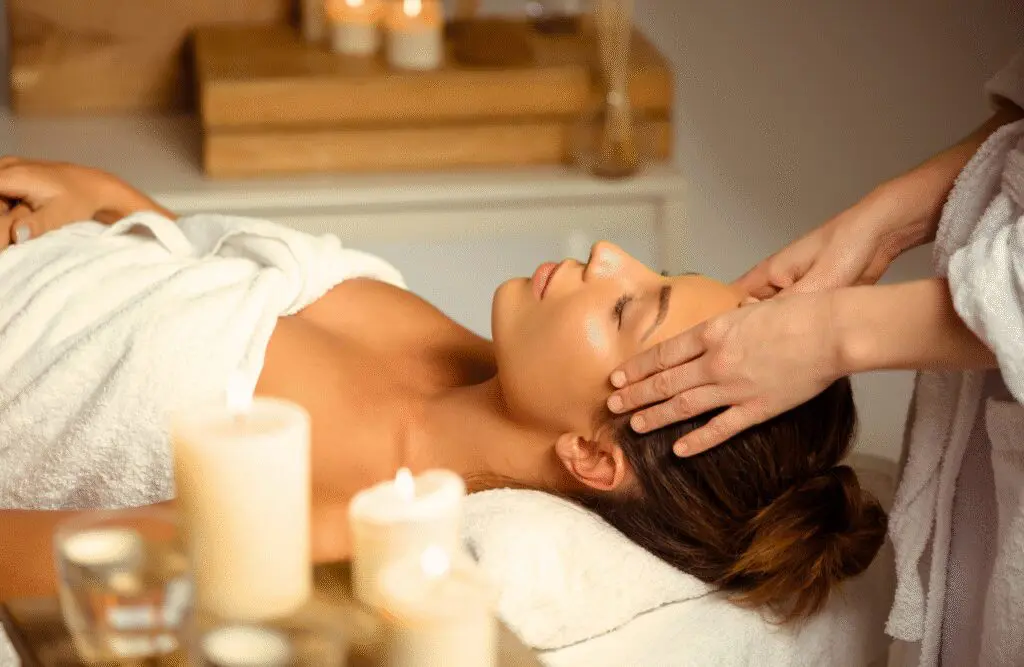 Woman having a face massage at a spa. Massage Therapy Brisbane. Head Massage Brisbane. Best Head Massage Near Me. Brisbane Livewell Clinic