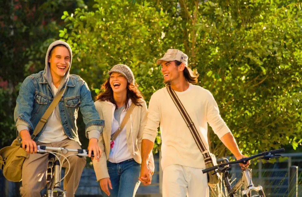 Group of three friends walking with their bicycles. Hypnotherapy near Hendra. Probiotics for Thrush. Osteopath Tingalpa. Naturopath Anxiety. Brisbane Livewell Clinic
