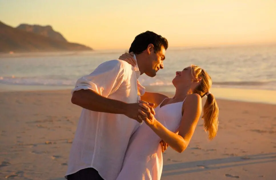 Couple dancing on the beach. Marriage Counselling Near Me. Low Libido. Naturopath Redcliffe. Brisbane Livewell Clinic