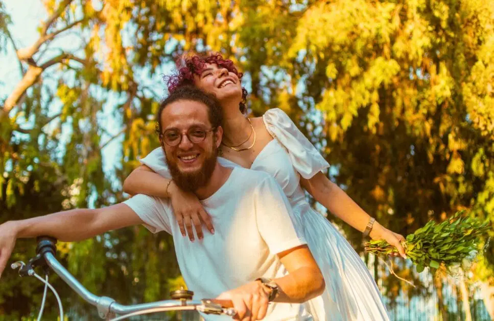 Couple riding a bicycle together. Hypnotherapy near Chermside West. Marriage Counselling Near Me. Naturopath Toowoomba. Brisbane Livewell Clinic