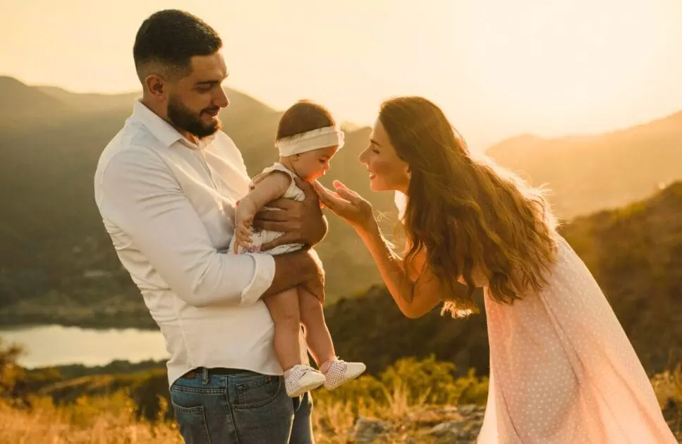 A happy family enjoying a sunset outdoors. Hypnotherapy near Kedron. Naturopath. Holistic Counselling Wavell Heights. Brisbane Livewell Clinic