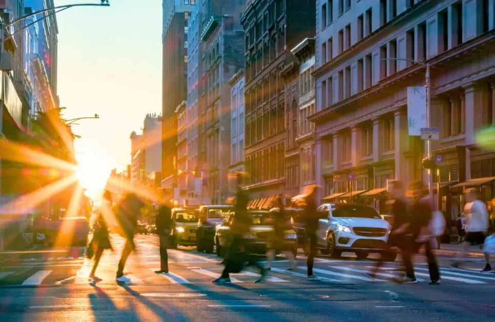 People walking across an intersention. Bridgeman Downs. Addiction Hypnotherapy. Osteopath Close to Me. Brisbane Livewell Clinic