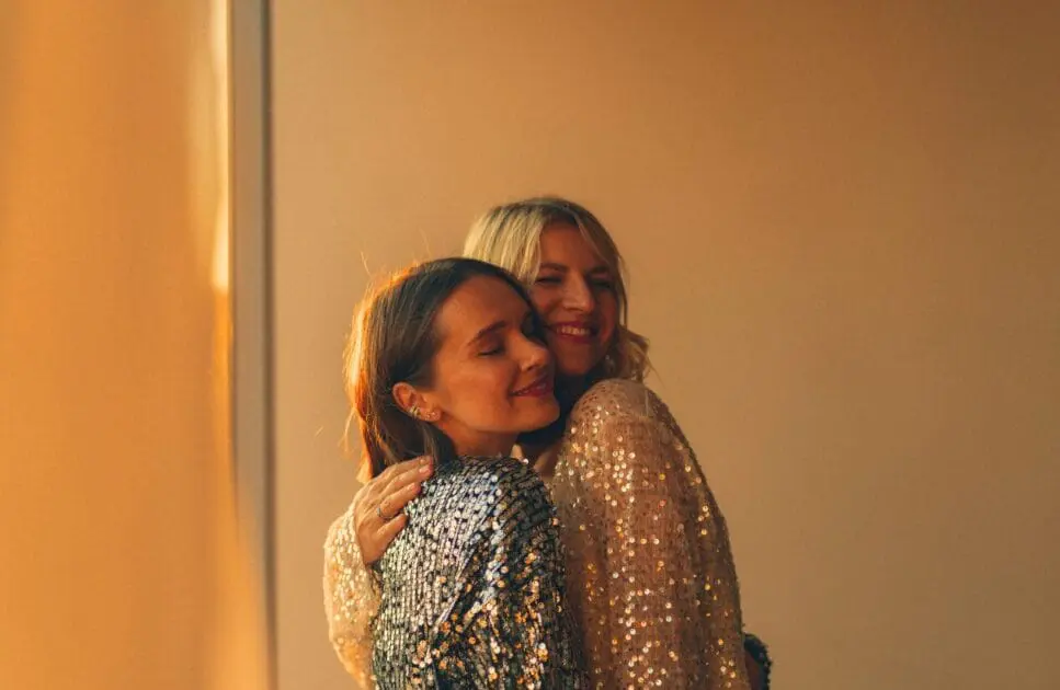 Two female friends embrace each other warmly. Counselling Services. Counselling Geebung. Counsellor Near Me. Counselling Balmoral. Brisbane Livewell Clinic