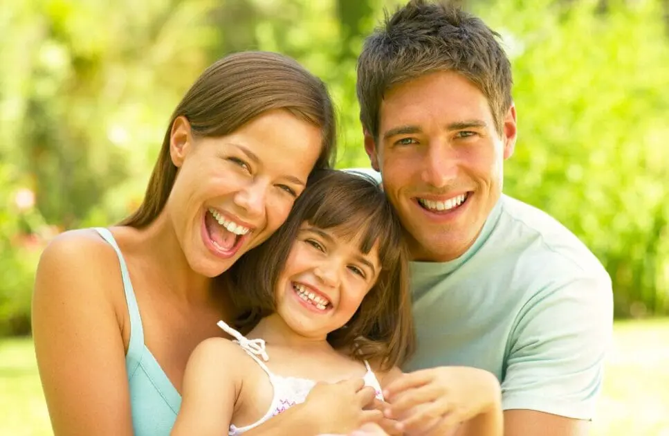 Mother and father embracing their young daughter. Naturopathic Anxiety Medication. Clinical Hypnotherapy. Methylation Test Near Me. Heavy Metal Detox for Kids. What is Leaky Gut Australia. Brisbane Livewell Clinic