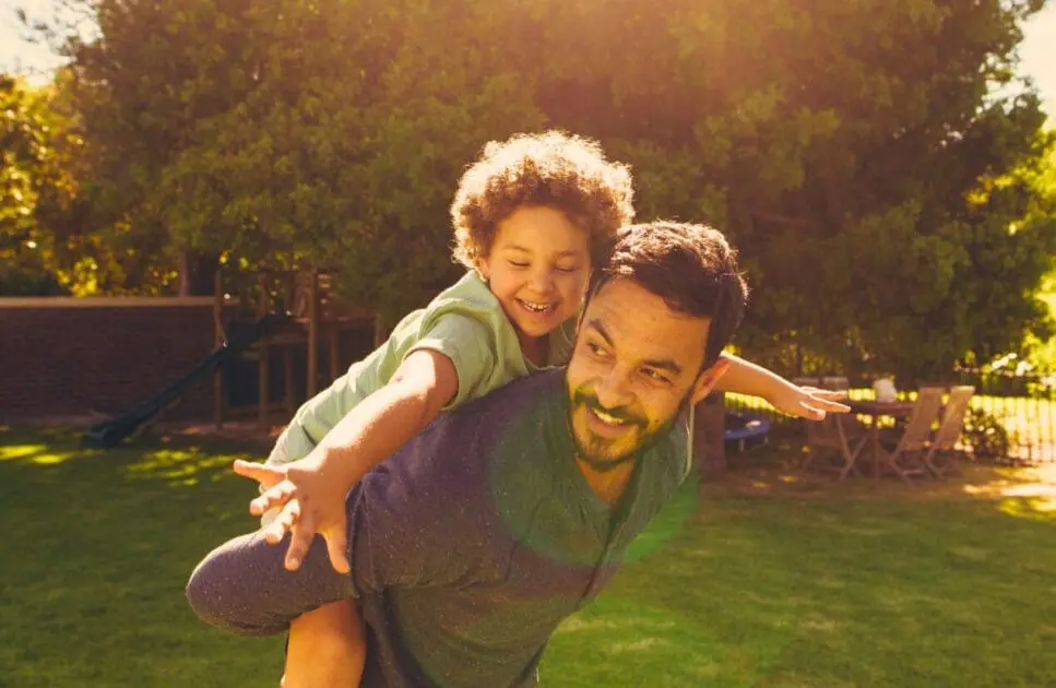 Father and son playing in the park. Genetic Methylation Testing Brisbane. Osteopath for Lower Back Pain. Hypnotherapy to Quit Smoking. Food Intolerance Testing Brisbane. Brisbane Livewell Clinic