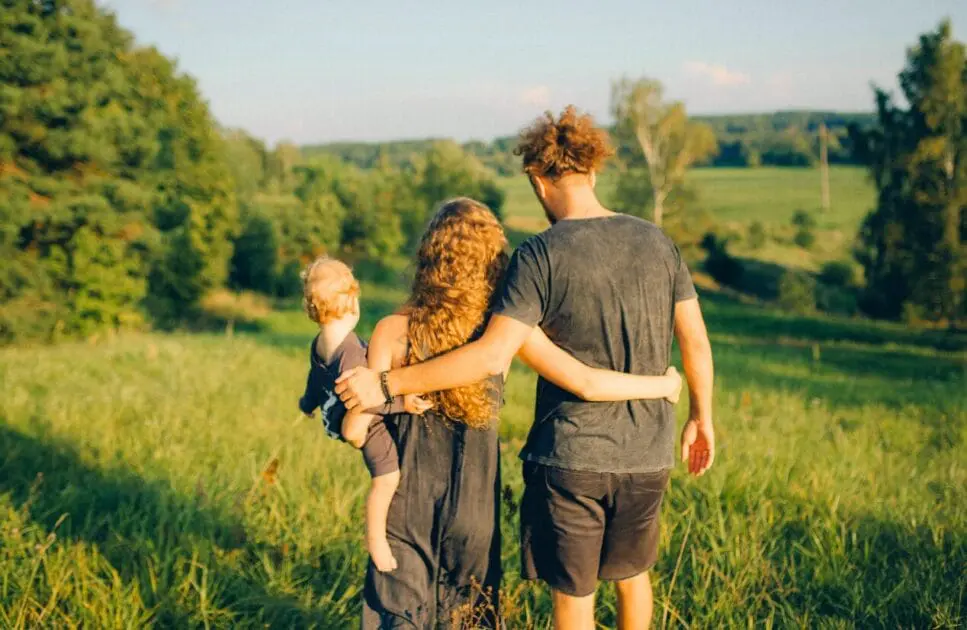 Family walking outdoors on a sunny day. Hypnotherapy near Clayfield. Brisbane Livewell Clinic. Marriage Counselling Near Me