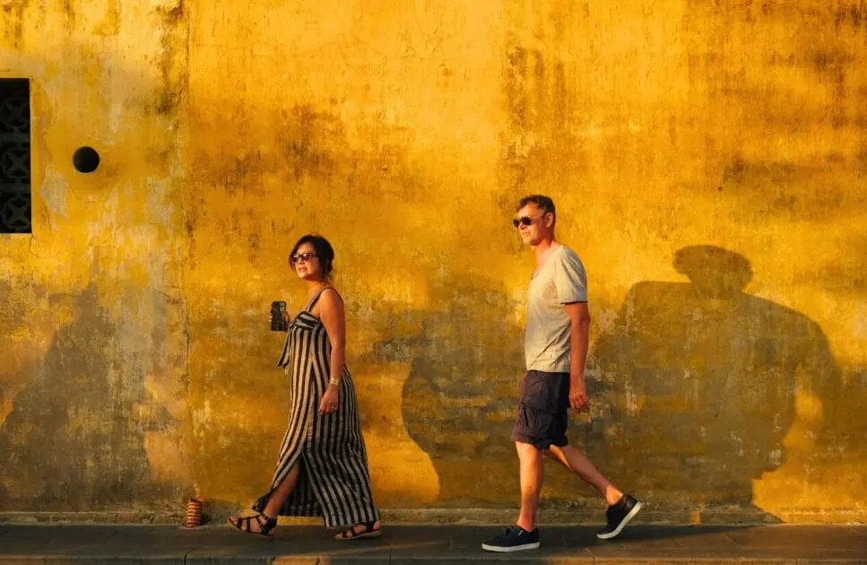 Man and woman walking on the street. Genetic Methylation Testing Australia. TCM Brisbane. Can an Osteopath Help with Posture. Brisbane Livewell Clinic