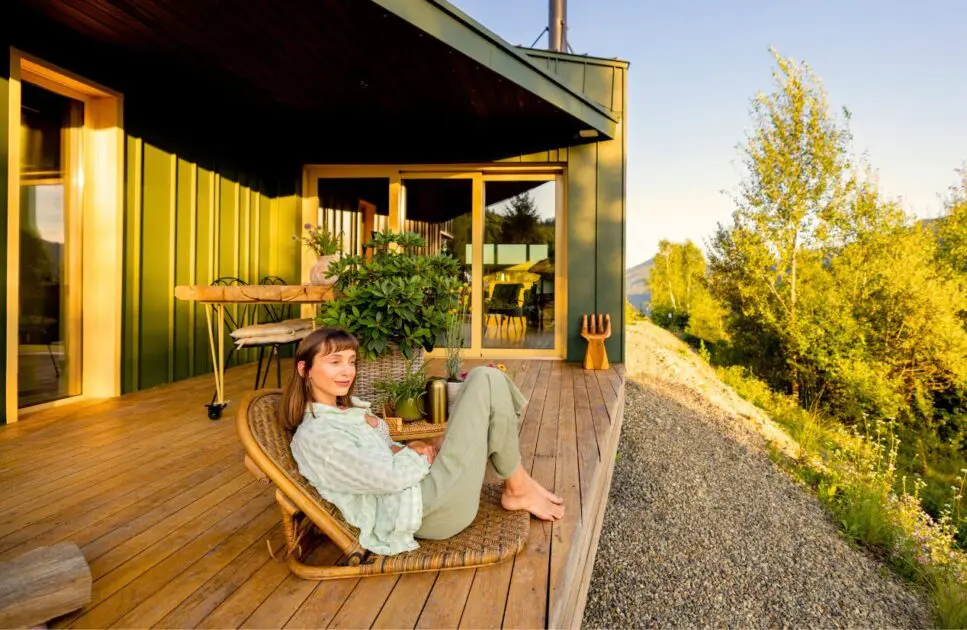 Woman relaxing on the wooden deck. Myofascial Release Therapy Massage Near Me. What Causes Painful Period. Brisbane Livewell Clinic